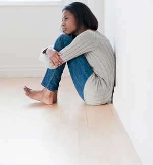 Woman Sitting on Floor